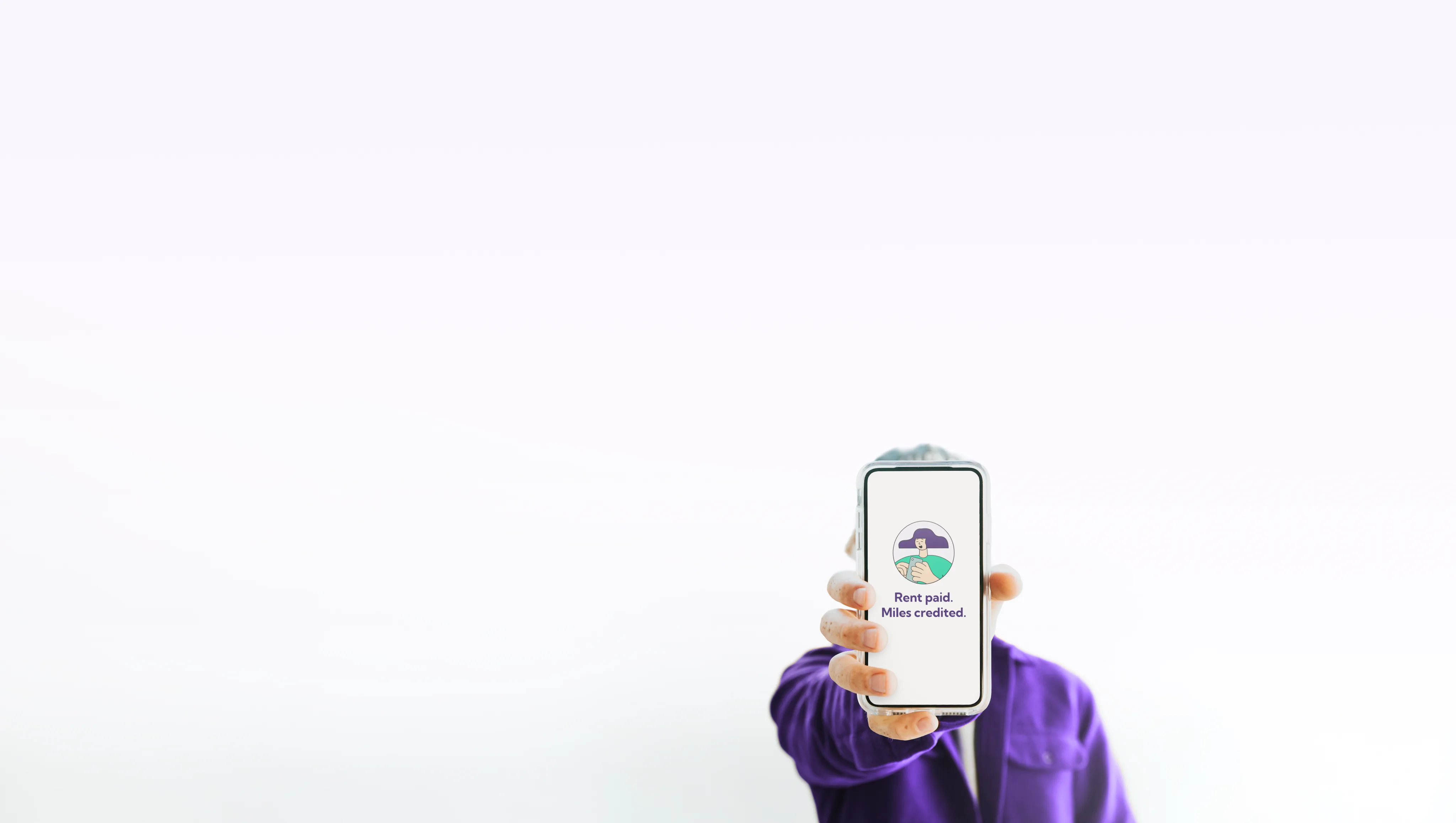 Person holding up a phone showing rent paid, miles credited